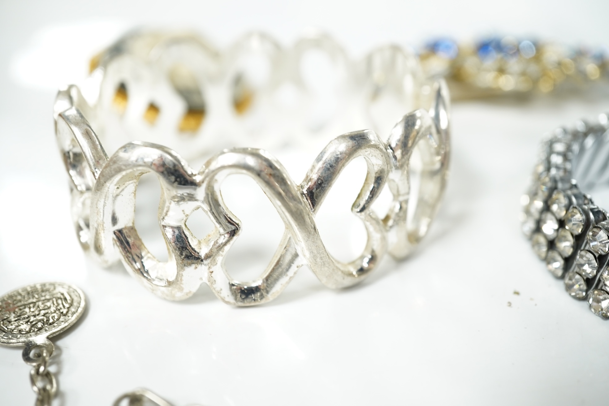 A large quantity of assorted costume jewellery, etc. including six small cut steel buttons.